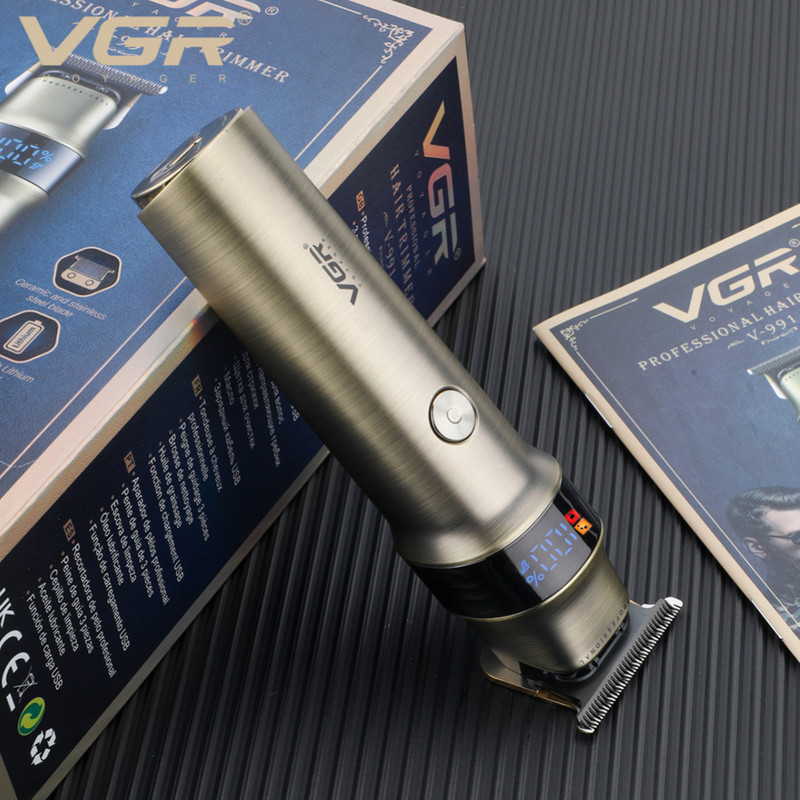 ماشین اصلاح موی سر و صورت وی جی ار مدل V-991 با تیغه سرامیک و استیل ضد زنگ، قابلیت اصلاح با شماره صفر، نمایش وضعیت باتری، عملکرد توربو، طراحی ارگونومیک، باتری 2000 میلیآمپر، شارژ با کابل USB، سه عدد شانه، دور موتور 7000 RPM
