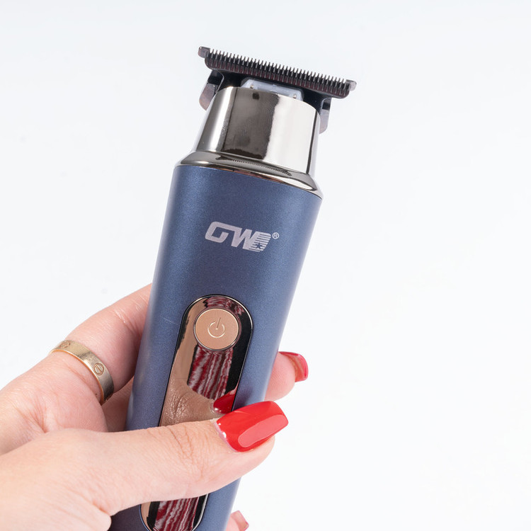 ماشین اصلاح موی سر و صورت جی دبلیو مدل GW-9876، اصلاح به صورت صفر زن، خط زن، منبع انرژی با کابل USB، تکنولوژی اصلاح به صورت تریم، اندازه اصلاح 1، 2 و 3 میلیمتر، بههمراه کابل USB، برس، روغن